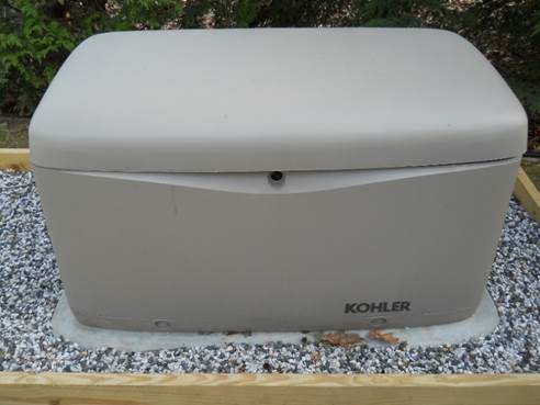 A grey box on a rock

Description automatically generated