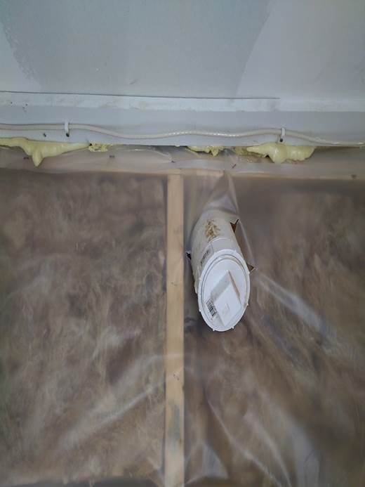 A spray can in a window

Description automatically generated